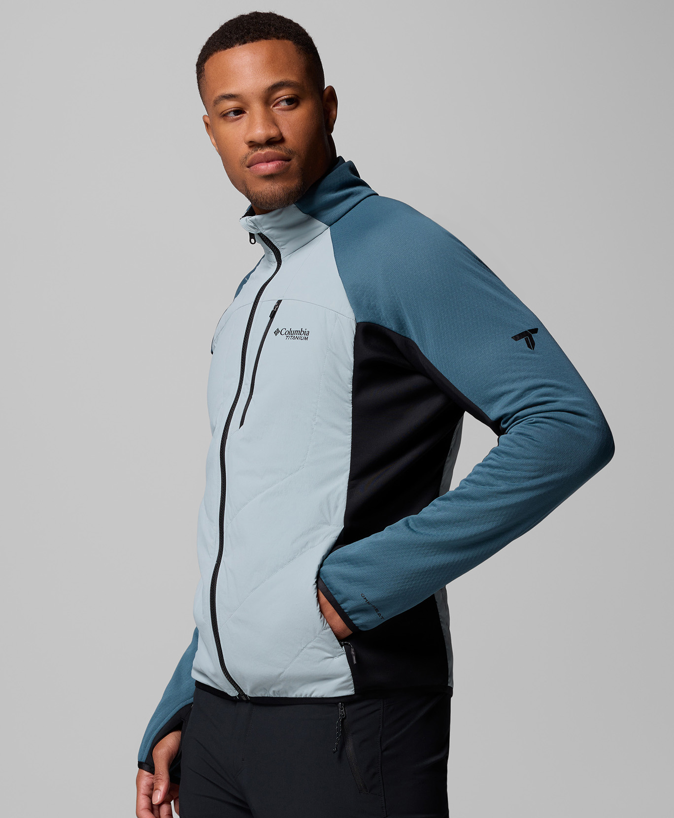 A man wearing a blue jacket