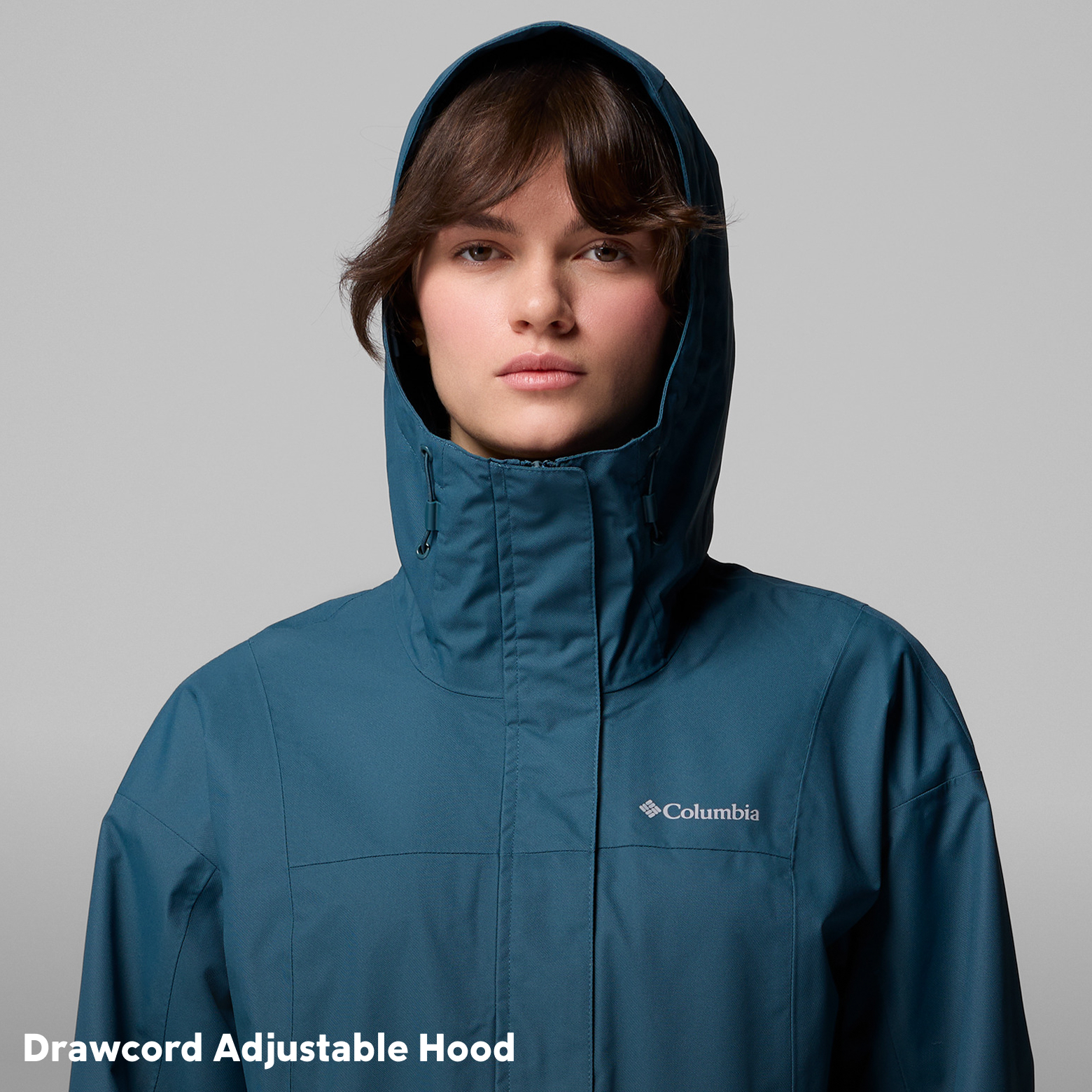 A woman wearing the Hikebound II Long Jacket