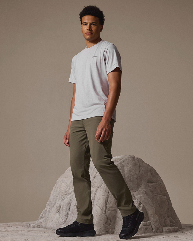 A man wearing green ROC pants