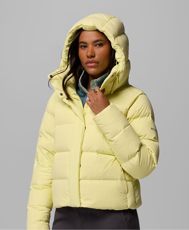 A woman wearing a yellow Amaze Puff