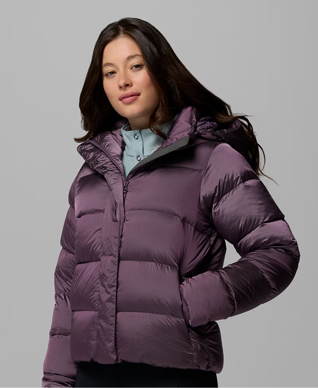 A woman wearing a purple Amaze Puff