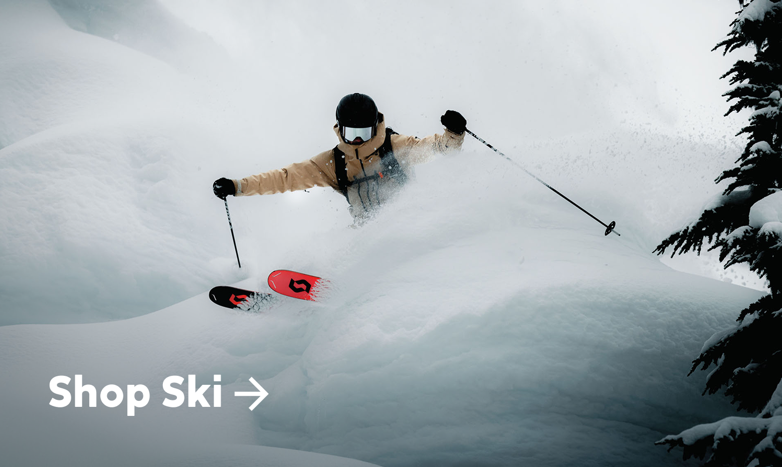 A man skiing flying over a snow bank