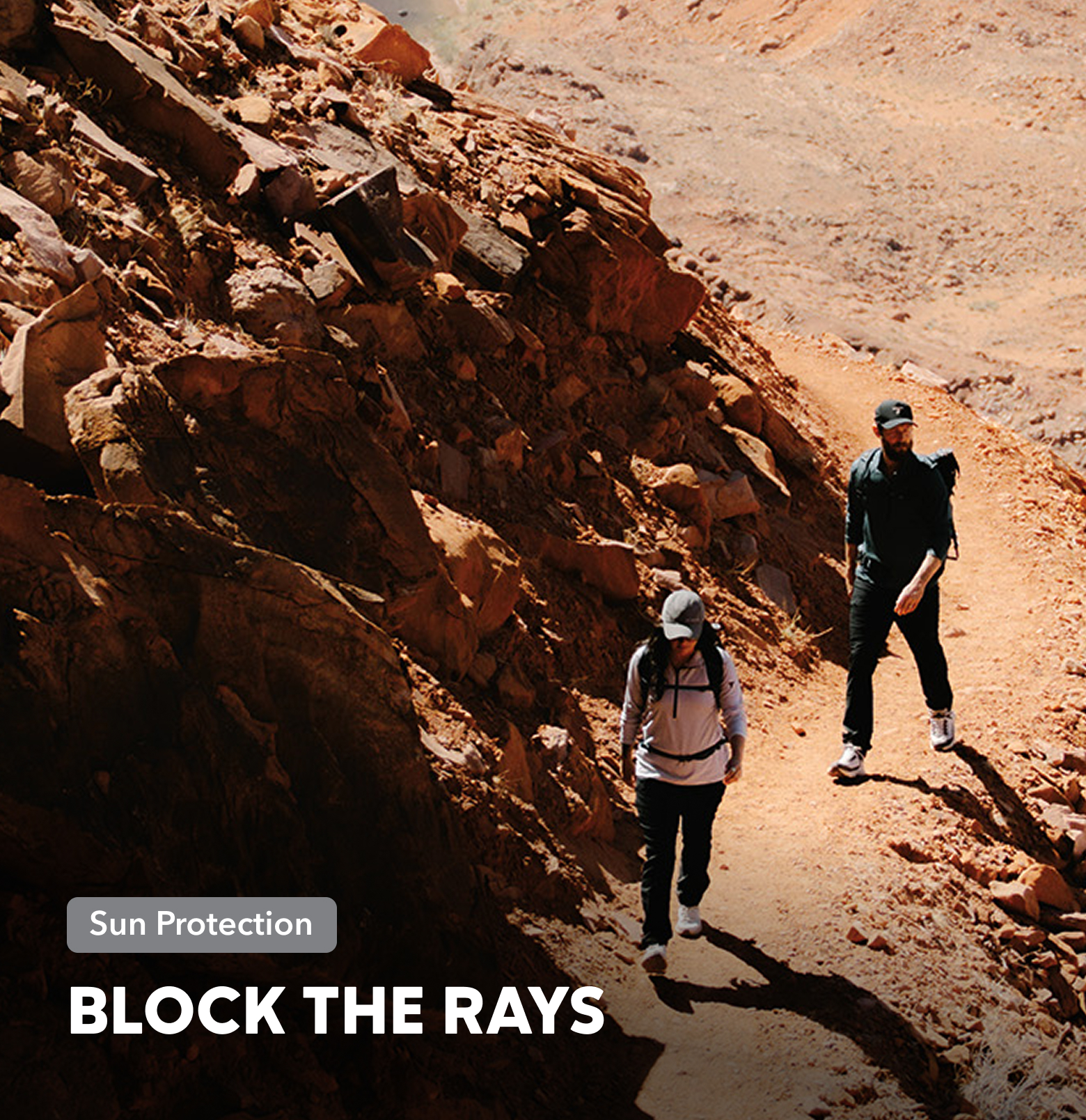 Two people hiking on a desert trail with text overlay 