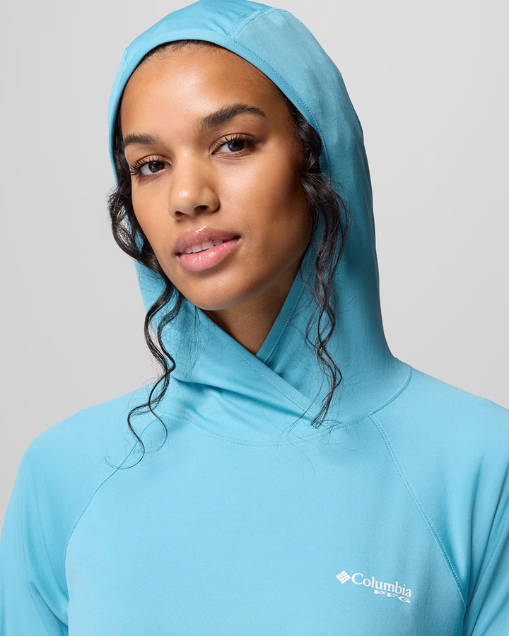 Woman wearing a blue hoodie