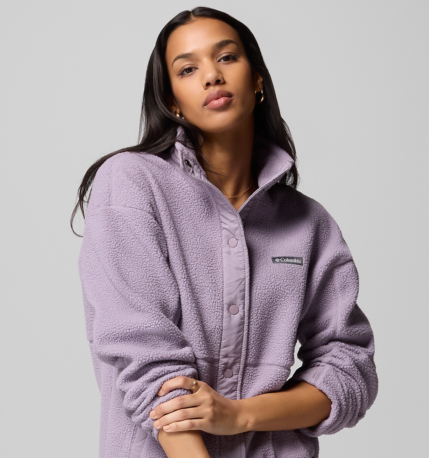 A woman wearing a purple fleece