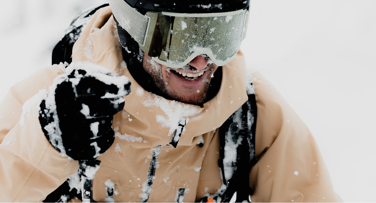 Smiling skier in the snow