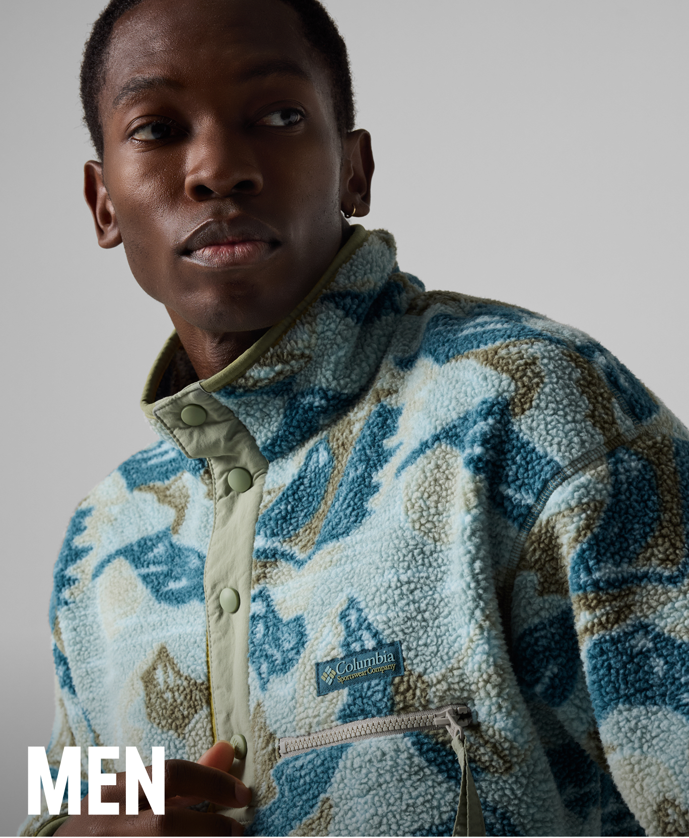A man wearing a printed fleece.