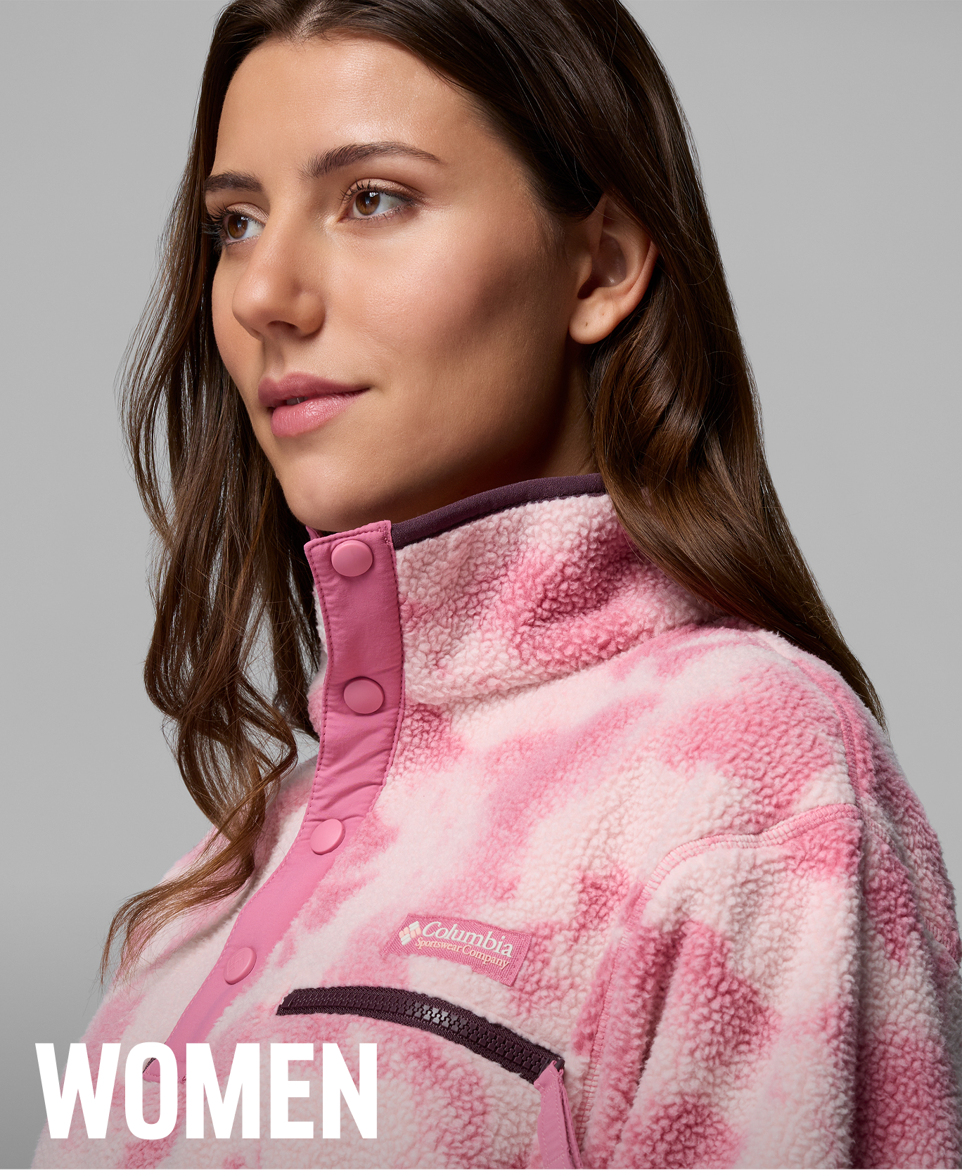 A woman wearing a printed fleece.