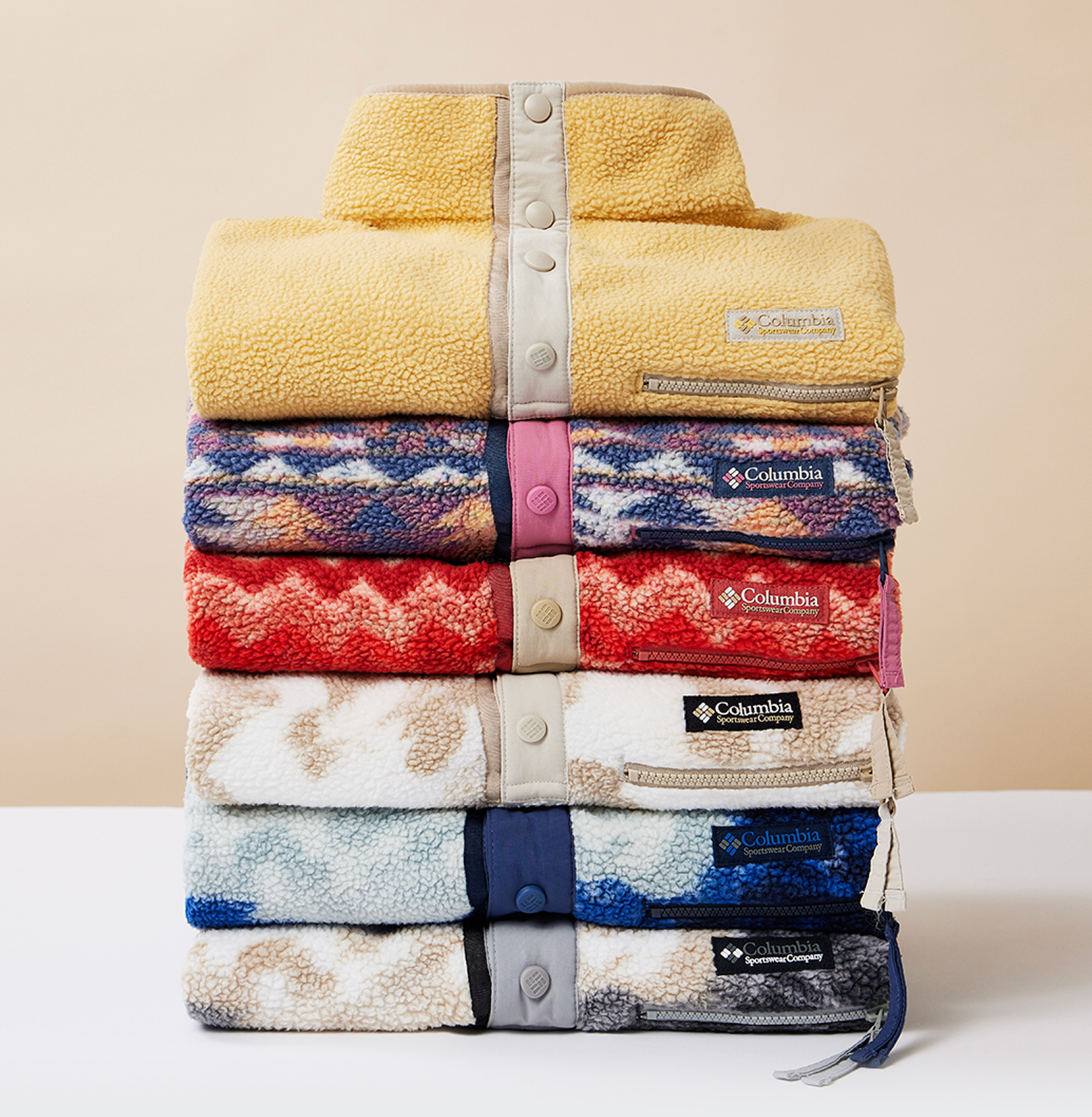 Stack of different colored Helvetia Fleece