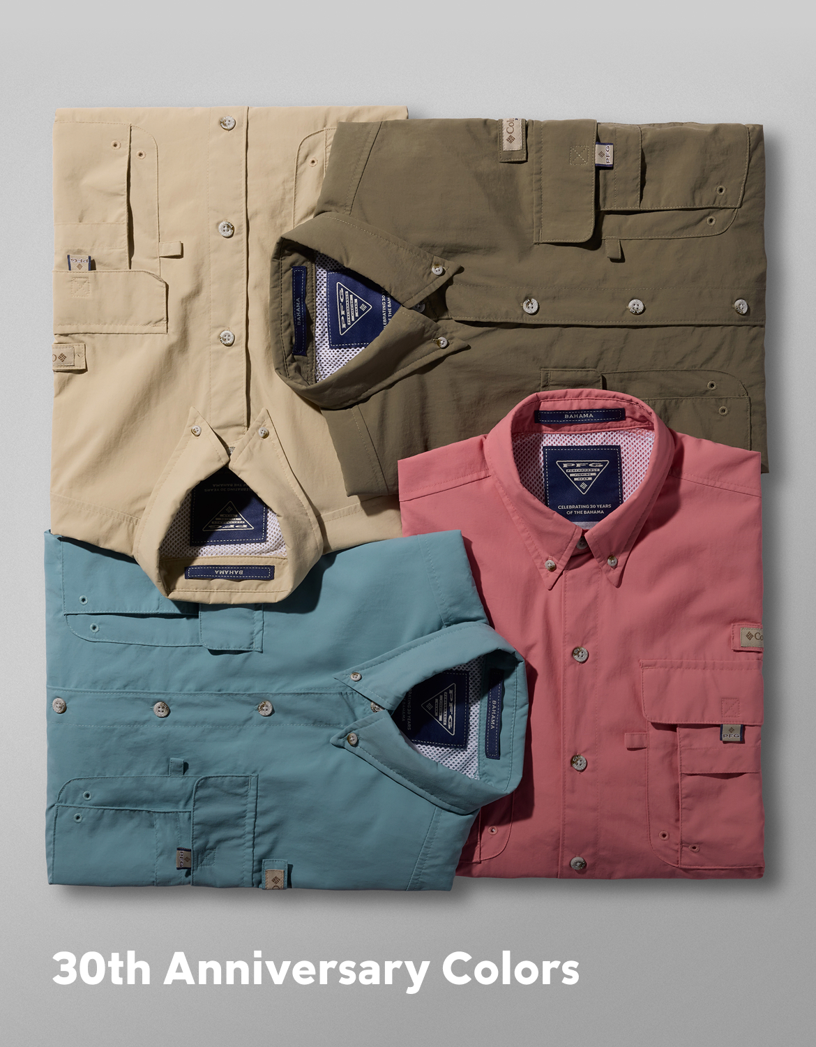 Image of several different colored Bahama shirts stacked. 30th anniversary colors. 