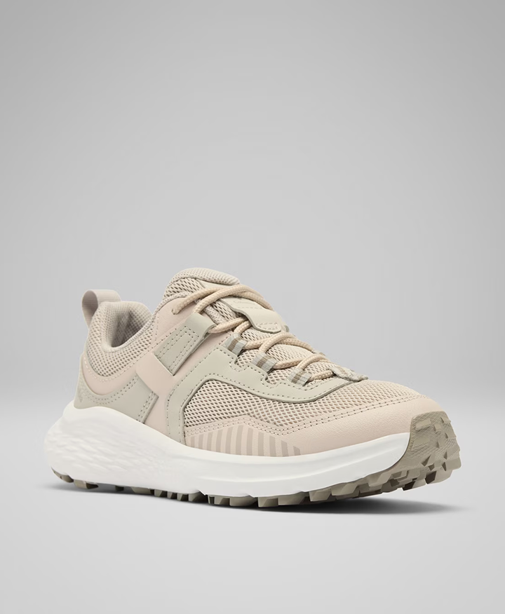 A kids' tan sneaker.