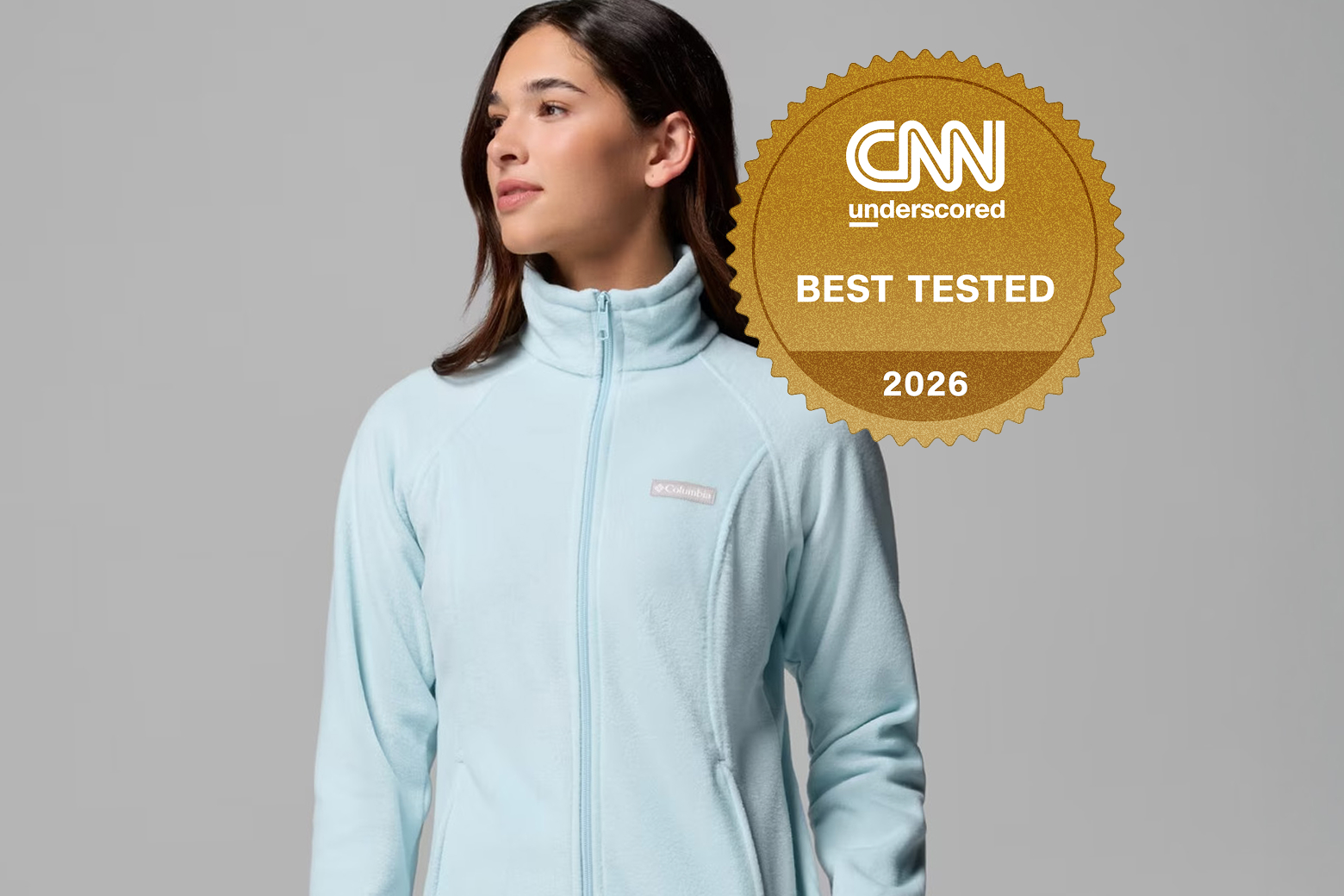 A woman wearing a blue fleece jacket with a CNN Best Tested badge over the image.