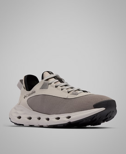 A grey and tan men's hiking shoe.