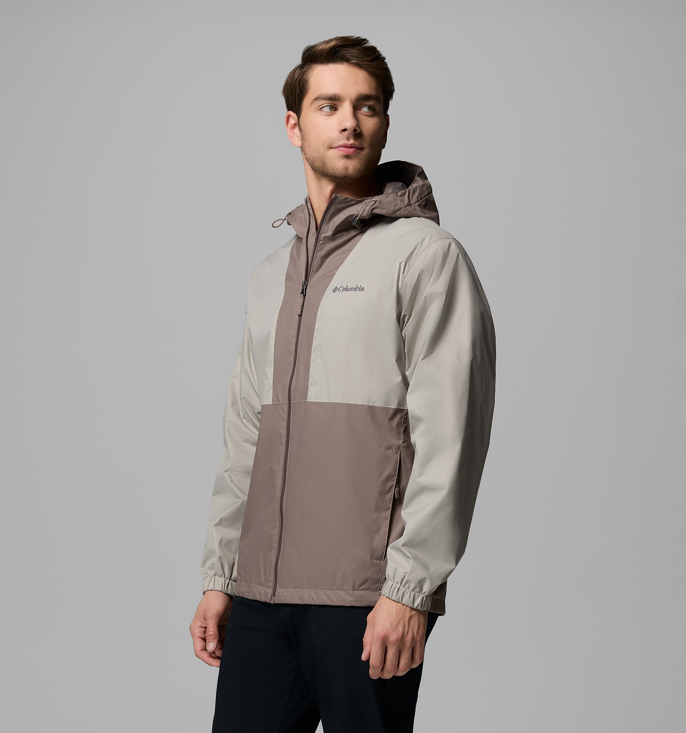 A studio image of a model wearing the Glenbrook Bend Rain Jacket.