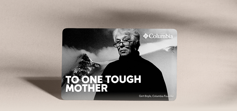 A Columbia gift card featuring Gert Boyle against a tan background.