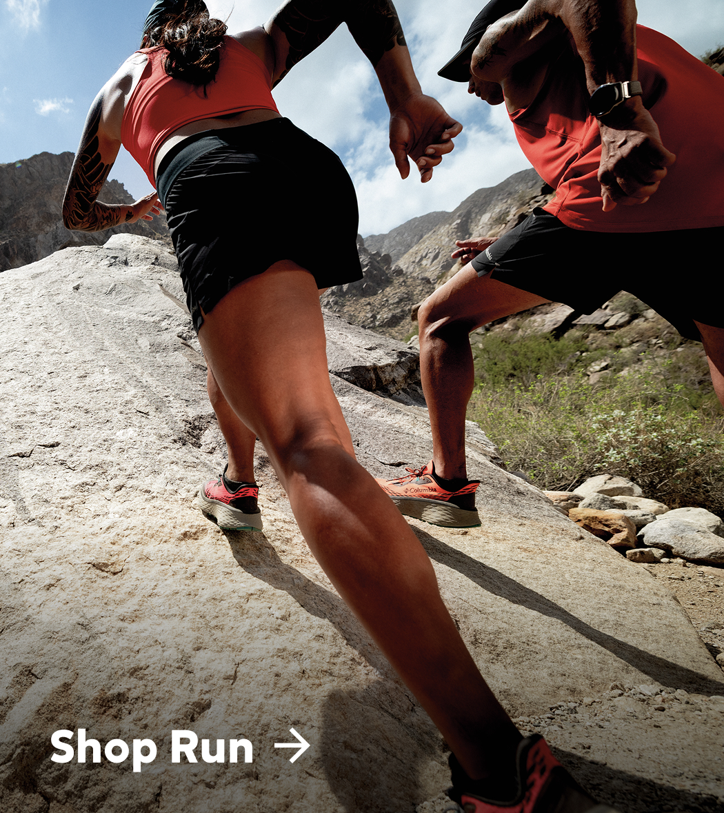 Shop Run over an image of two people running up a large boulder