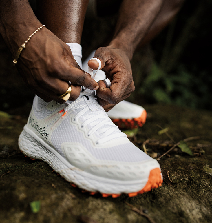 Men's white sneakers.