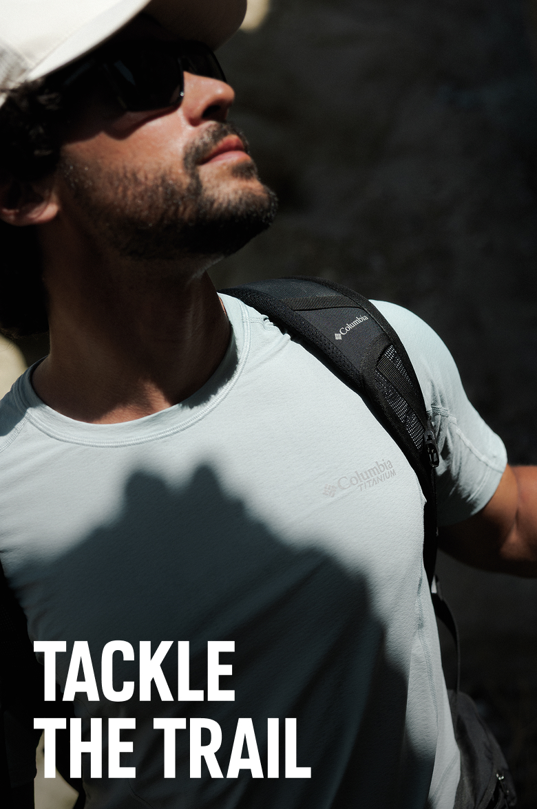 A man hiking with text that says TACKLE THE TRAIL