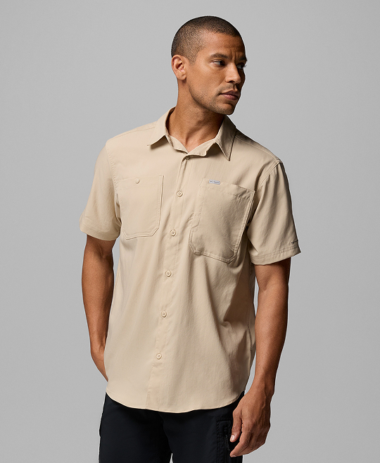 A man wearing a button-up shirt