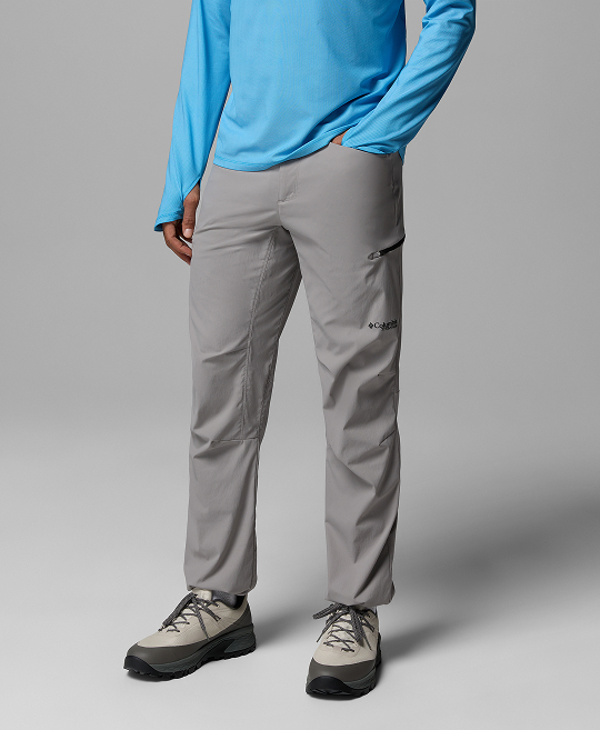A model wearing grey hiking pants