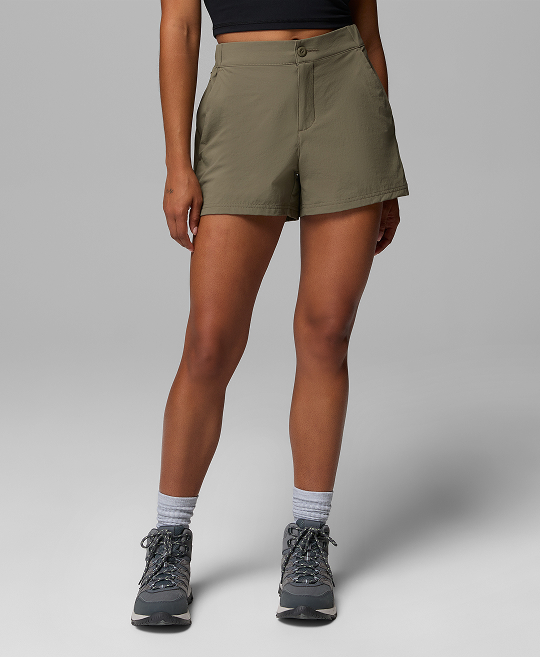 A model wearing olive hiking shorts