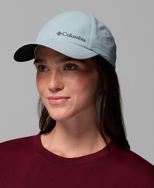 A woman wearing a baseball hat