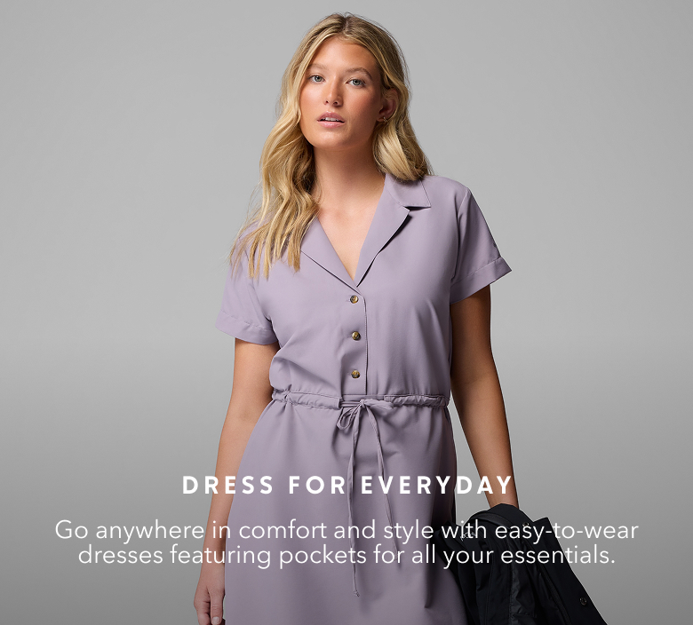 Woman wearing an everyday Columbia dress in a studio.