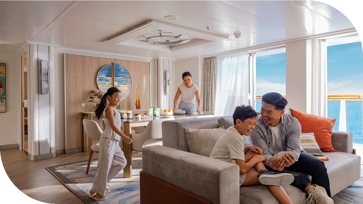 A family relaxes in a Sanctuary Collection stateroom..