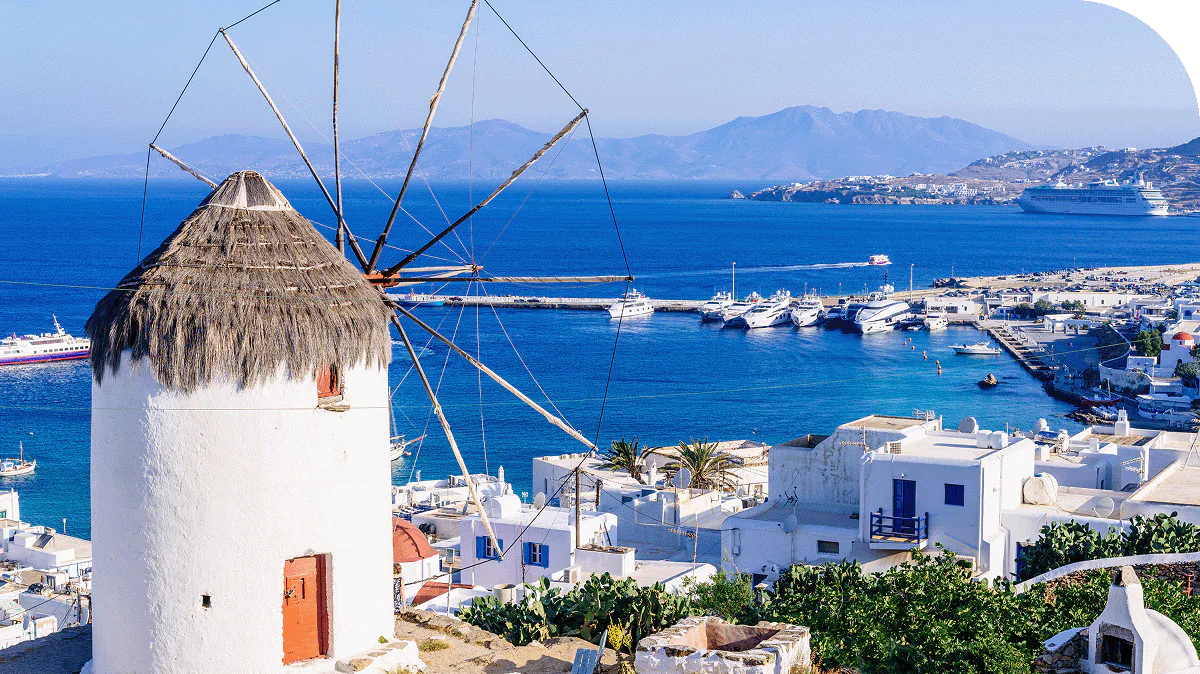 Windmills above Cyclades, Greece
