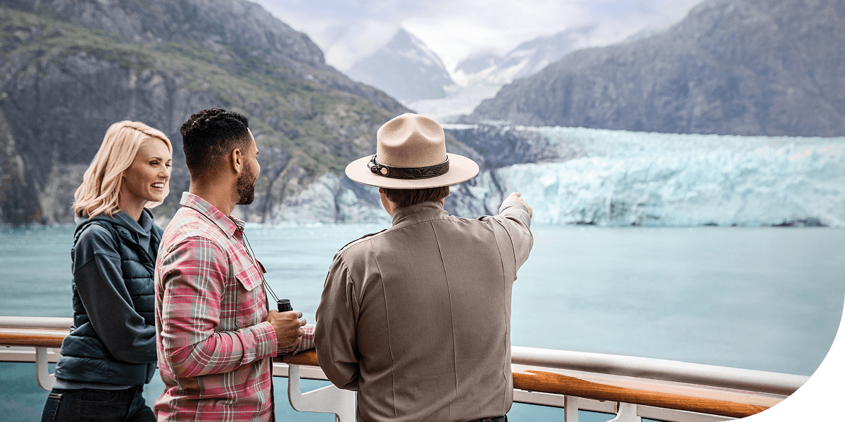 Park ranger showing guests Glacier Bay National Park, Alaska.