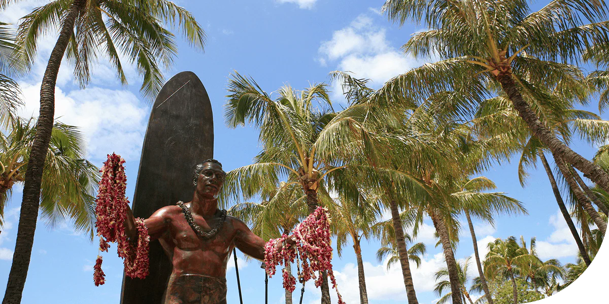 Statue is of Duke Kahanamoku. Honolulu, Hawaii.