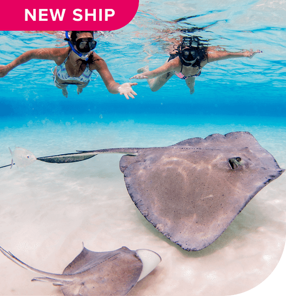 New ship. Mother and daughter snorkeling with sting rays. Grand Cayman, Cayman Islands.