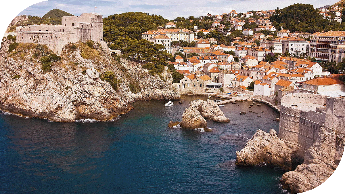 The town of Dubrovnik, Croatia, nestled by the sea.