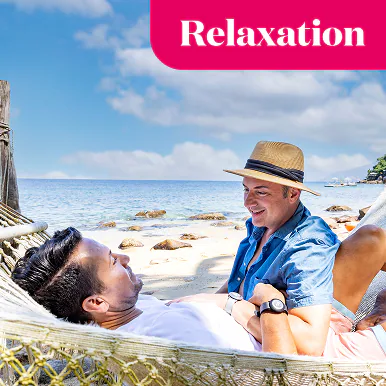 Relaxation. A couple in a hammock