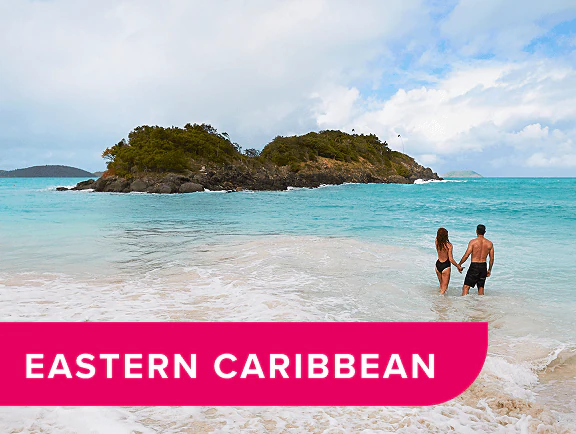 Eastern Caribbean. Couple wading in the Caribbean water.