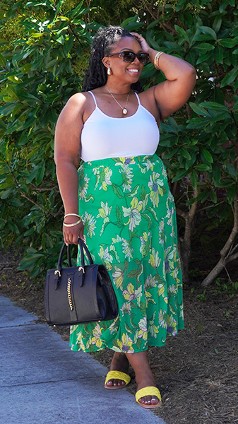Person wearing floral skirt