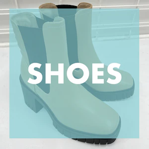 Brown boots with a teal overlay that says 