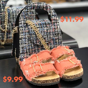 A tweed‑style mini handbag with a chain strap for $11.99 displayed behind coral fringe slide sandals for $9.99.