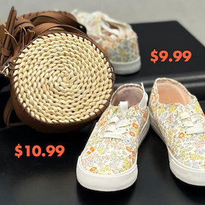 A straw‑style round crossbody bag beside floral lace‑up sneakers, displayed with prices of $10.99 and $9.99.