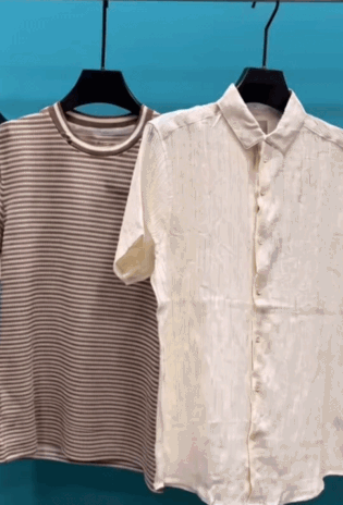 Two shirts displayed on hangers: a brown and white striped short-sleeve T-shirt and a light-colored short-sleeve button-up shirt with a subtle textured pattern.