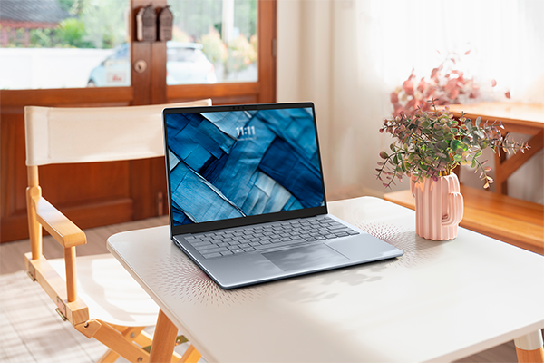 Dell 14 Plus Non Touch Laptop on table in cafe.