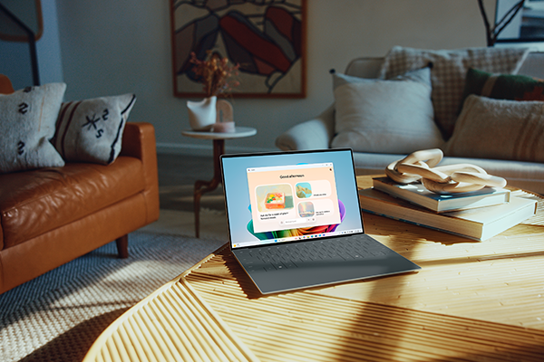 Sitting on coffee table is the XPS 13 Touch OLED Notebook