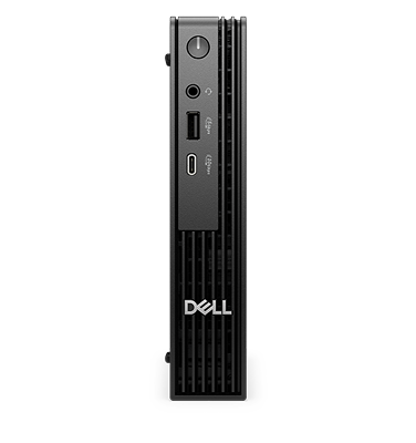 A Dell desktop computer on a dark gray                                                 background.