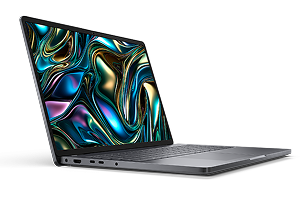 Side view of a Dell laptop computer on a dark gray                                                                     background.