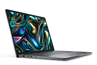 Side view of a Dell laptop computer on a dark gray                                                                                 background.