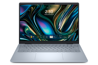 A Dell laptop computer on a dark gray background.