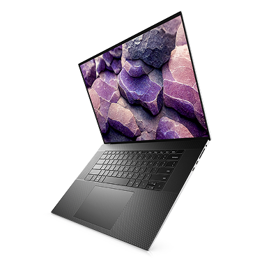 A Dell laptop computer suspended in midair.