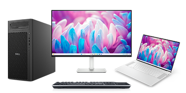 A Dell desktop computer, monitor, wireless keyboard and laptop computer.