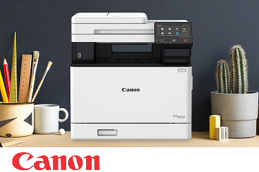 A Canon multifunction printer on an office desktop.
