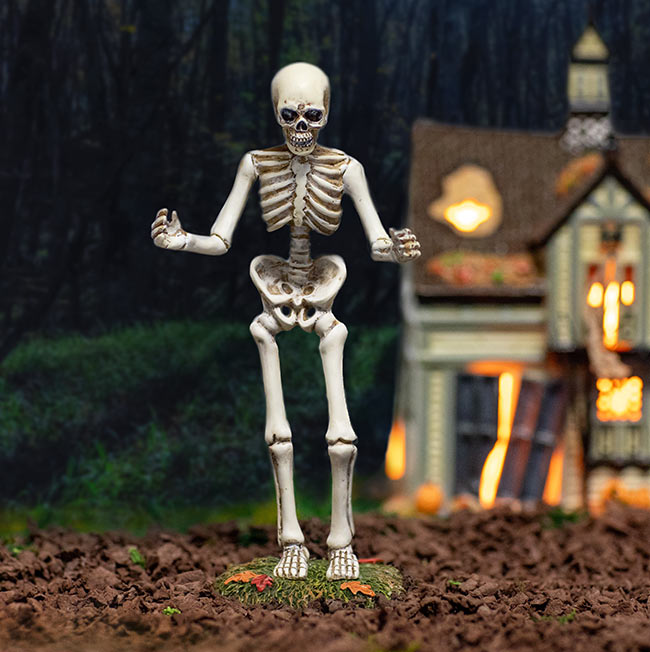 Skeleton accessory towering in Trick-or-Treat Lane.